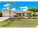 Charming single-story home with a well-manicured lawn, beautiful landscaping, and inviting curb appeal at 9891 Se 138Th Loop, Summerfield, FL 34491