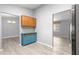Eat-in kitchen area with custom blue cabinets and views to the other rooms in the home at 9891 Se 138Th Loop, Summerfield, FL 34491