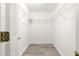 Walk-in closet with metal shelving for optimal organization and storage at 9891 Se 138Th Loop, Summerfield, FL 34491
