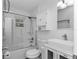 Bathroom featuring a glass shower, toilet and modern vanity at 111 Almond Rd, Ocala, FL 34472