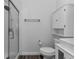Bright bathroom featuring a walk-in shower, updated fixtures, and a modern vanity at 111 Almond Rd, Ocala, FL 34472