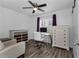 Office space with a desk, drawers, chair, and ceiling fan at 111 Almond Rd, Ocala, FL 34472