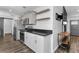Galley kitchen with stainless steel appliances, granite counters, and plenty of cabinet space at 111 Almond Rd, Ocala, FL 34472