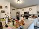 Kitchen featuring granite countertops, white cabinets, and stainless steel appliances at 120 Fisher Ct, Ocklawaha, FL 32179