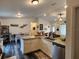 Open concept kitchen with stainless steel appliances and dining area at 120 Fisher Ct, Ocklawaha, FL 32179