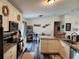 Bright kitchen with stainless steel appliances and granite countertops at 120 Fisher Ct, Ocklawaha, FL 32179