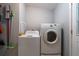 Bright laundry room with LG washer and dryer and utility supplies at 1228 Maria Ct, Lady Lake, FL 32159