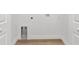 Spacious laundry room featuring modern hookups and flooring at 12974 Se 42Nd Ct, Belleview, FL 34420