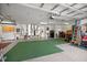 Large garage featuring ample storage, laundry area, and plenty of open space at 13015 Se 93Rd Cir, Summerfield, FL 34491