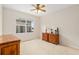 Bedroom with two wooden dressers and a window at 13495 Se 93Rd Court Rd, Summerfield, FL 34491