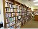 A bookstore or library features rows of wooden bookshelves packed with a diverse collection of books at 14117 Sw 115Th Cir, Dunnellon, FL 34432
