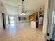 Spacious open concept, vaulted ceilings, bright living room with tiled floors at 14117 Sw 115Th Cir, Dunnellon, FL 34432