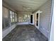 Sunroom with tile flooring and multiple windows at 14117 Sw 115Th Cir, Dunnellon, FL 34432