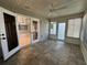 Enclosed patio featuring tiled floor and a ceiling fan at 14117 Sw 115Th Cir, Dunnellon, FL 34432