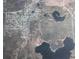 Aerial view of a neighborhood near winding lakes and wooded areas, with a red marker indicating a location at 1675 Se 190Th Ave, Silver Springs, FL 34488