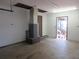 Spacious garage with an open doorway to the outside at 1675 Se 190Th Ave, Silver Springs, FL 34488