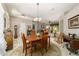 Cozy dining area featuring a wooden table set and decorative furniture at 18328 Sw 73Rd Loop, Dunnellon, FL 34432