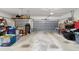 Spacious garage with ample storage space and two garage doors at 18328 Sw 73Rd Loop, Dunnellon, FL 34432
