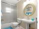 Small bathroom with vanity, toilet, and a glass shower enclosure at 200 Se 145Th St, Summerfield, FL 34491