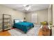 Bright bedroom with natural light and hardwood floors at 200 Se 145Th St, Summerfield, FL 34491