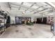 Spacious garage with organized storage and ample parking at 200 Se 145Th St, Summerfield, FL 34491