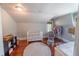 Bedroom room featuring a crib, hardwood floors, and window with natural light at 20549 9Th St, Mc Intosh, FL 32664