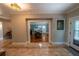 Tile entryway with view to dining room at 20549 9Th St, Mc Intosh, FL 32664