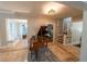 Foyer with tiled floors, piano, and access to various rooms providing a warm welcome at 20549 9Th St, Mc Intosh, FL 32664