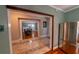 A view of the dining room, through an interior entryway at 20549 9Th St, Mc Intosh, FL 32664