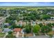 Aerial view showcasing the home's position in a lush, green neighborhood at 219 Marion Oaks Ln, Ocala, FL 34473