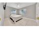 Bright bedroom with tile flooring and natural light from two windows at 219 Marion Oaks Ln, Ocala, FL 34473