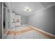 Bonus space with white cabinets, counter space, tile floors and slider to back at 219 Marion Oaks Ln, Ocala, FL 34473