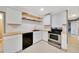 Updated kitchen with stainless steel appliances and butcher block countertops at 219 Marion Oaks Ln, Ocala, FL 34473