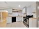 Modern kitchen with stainless steel appliances and butcher block countertops at 219 Marion Oaks Ln, Ocala, FL 34473