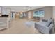 Open-concept living area with kitchen, dining space, and natural light at 219 Marion Oaks Ln, Ocala, FL 34473