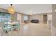 Well-lit living space with dining area and stylish furnishings at 219 Marion Oaks Ln, Ocala, FL 34473