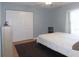 Bedroom with a closet, a ceiling fan, and a window with curtains at 2909 Ne 25Th St, Ocala, FL 34470