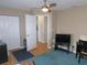 Bright bedroom featuring a ceiling fan, and a television on a table at 2909 Ne 25Th St, Ocala, FL 34470