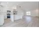 Modern kitchen features stainless steel appliances, a center island, and an open layout at 400 Mariion Oaks Crse, Ocala, FL 34473