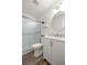Tastefully updated bathroom featuring a glass enclosed shower and modern vanity at 4095 Sw 144Th St, Ocala, FL 34473