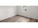 Bright bedroom featuring neutral walls, modern flooring, and natural light at 4095 Sw 144Th St, Ocala, FL 34473