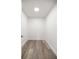 Bright walk-in closet featuring modern flooring and neutral wall color at 4095 Sw 144Th St, Ocala, FL 34473