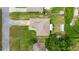 Birds eye view of backyard featuring a storage shed, a patio, and mature trees at 5263 Nw 62Nd Nw Ave, Ocala, FL 34482