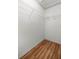 Walk-in closet with wire shelving and hardwood floors, providing ample storage space at 5263 Nw 62Nd Nw Ave, Ocala, FL 34482