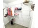 Well-organized closet with adjustable shelving, providing ample storage space for clothes and accessories at 5263 Nw 62Nd Nw Ave, Ocala, FL 34482