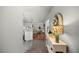 Open-concept living space with hardwood floors connecting the kitchen and living area, offering a spacious feel at 5263 Nw 62Nd Nw Ave, Ocala, FL 34482