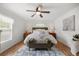 Inviting main bedroom featuring a comfortable bed, side tables, and a neutral color palette at 5263 Nw 62Nd Nw Ave, Ocala, FL 34482