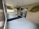 Covered patio with plenty of space for entertaining, with outdoor decor and a sliding glass door at 5263 Nw 62Nd Nw Ave, Ocala, FL 34482