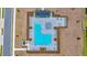 Overhead shot of resort-style community pool with lounge area, perfect for relaxation and recreation at 5621 Sw 90Th Ln, Ocala, FL 34476