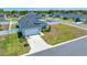 Charming single-story home with a two-car garage, basketball hoop, and well-maintained lawn at 5621 Sw 90Th Ln, Ocala, FL 34476